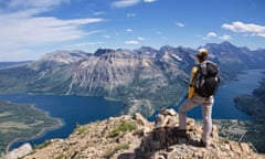 woman on top of canadian mountain