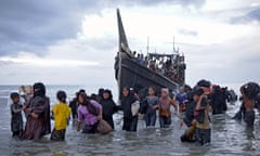 Rohingya refugees disembark from a boat  North Aceh, Indonesia