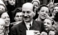 Politics, London, England, 5th July 1945, The Deputy Prime Minister in the wartime coalition Clement Attlee, pictured chatting to constituents in his Limehouse constituency where he is the Labour candidate for the General Election, Attlee was brought to power and was the first Prime Minister after the end of the Second World War  (Photo by Popperfoto/Getty Images)