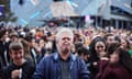 People playing kazoos in Melbourne's Federation Square on Saturday as part of Rising festival’s 10,000 Kazoos event