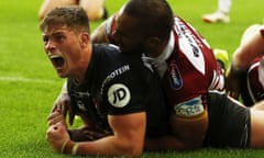 St Helens’ Morgan Knowles celebrates scoring their second try against Wigan.