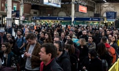 Passengers wait for a delayed trains in Victoria station during Southern Railway strike action.