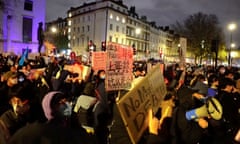 People protest against China's Covid curbs in front of the Chinese embassy in London in November