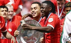 Sergiño Dest (left) celebrates PSV Eindhoven’s title with Johan Bakayoko. 