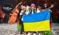 Kalush Orchestra with the Ukrainian flag after winning the 2022 Eurovision song contest.