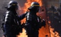 Paris, France

Riot police walk past a burning barricade as they clash with protesters