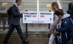 People walking along Whitehall in London.