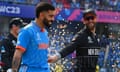 Kane Williamson and Virat Kohli walk out before the start of the World Cup semi-final