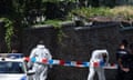 Forensic officers at the scene of the attack outside the Israeli embassy in Belgrade.