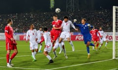 Russia (red shirts) play in a friendly against Tajikistan last November.