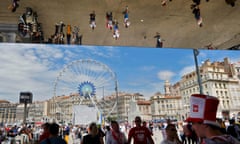 Poland fans reflected in ceiling of subway entrance in Marseille - EURO 2016<br>Football Soccer -EURO 2016 - Marseille, France -21/6/16 -Poland fans reflected in ceiling of subway entrance at the old port of Marseille, France.     REUTERS/Wolfgang Rattay