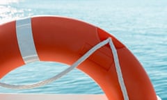 red lifesaver on a boat and sea background