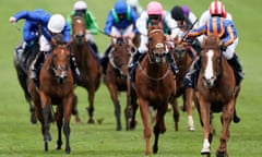 Love (right) wins the 1,000 Guineas at Newmarket on Sunday.