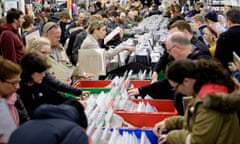 Customers look through racks of vinyl records at Rough Trade East in London on 19 April 2014, Record Store Day.