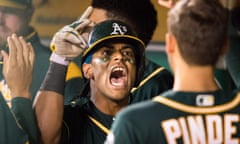 MLB: Los Angeles Dodgers at Oakland Athletics<br>Aug 7, 2018; Oakland, CA, USA; Oakland Athletics designated hitter Khris Davis (2) celebrates in the dugout after hitting a two-run home run against the Los Angeles Dodgers in the sixth inning at Oakland Coliseum. Mandatory Credit: John Hefti-USA TODAY Sports