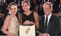 French director Julia Ducournau (centre) next to French actor Vincent Lindon and French actor Agathe Rousselle after winning the Palme d’Or for Titane at Cannes.