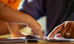 Father and son reading<br>AAA5NJ Father and son reading