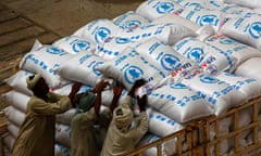 (FILES) This file photo taken on March 19, 2017 shows Sudanese workers as they offload US aid destined for South Sudan from the World Food Programme (WFP) at Port Sudan.
The US State Department laid out plans on May 23, 2017 to put "America first" and to slash Washington's budget for diplomacy and foreign aid by more than 30 percent. Secretary of State Rex Tillerson said President Donald Trump's dramatic plans, which will be reviewed by Congress, would make government "leaner and more accountable."
If the proposed cuts are approved by US lawmakers, the State Department and USAID budget for 2018 will be $37.6 billion, down from an estimated 2017 spend of $54.9 billion. / AFP PHOTO / ASHRAF SHAZLYASHRAF SHAZLY/AFP/Getty Images