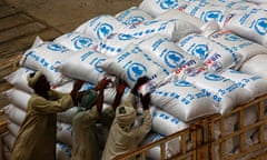 Sudanese workers offload US aid destined for South Sudan from the World Food Programme at Port Sudan. The US State Department laid out plans on May 23 to slash Washington’s budget for diplomacy and foreign aid by more than 30 percent.