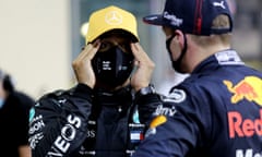 Lewis Hamilton, left, speaks to Max Verstappen after qualifying in Abu Dhabi on Saturday.