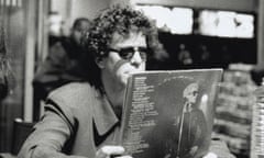 Lou Reed holding a copy of Metal Machine Music at an in-store signing in Paris, September 19, 1996. © Mila Reynaud.