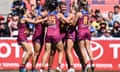 Brisbane’s Dakota Davidson celebrates with her Lions teammates after scoring a goal in the 2023 AFLW grand final against North Melbourne at Ikon Park.