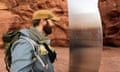 David Surber is seen after discovering the location of a metal monolith in Red Rock Desert, Utah, U.S., November 25, 2020, in this still image obtained from a social media video. @davidsurber_ via REUTERS ATTENTION EDITORS - THIS IMAGE HAS BEEN SUPPLIED BY A THIRD PARTY. NO RESALES. NO ARCHIVES. MANDATORY CREDIT.