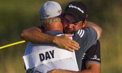 Jason Day hugs his caddie Colin Swatton