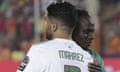 Riyad Mahrez and Sadio Mané hug at the Africa Cup of Nations final.