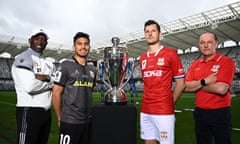 Macarthur FC head coach Dwight Yorke and captain Ulises Davila, and Sydney United head coach Miro Vlastelica (right) and captain Adrian Vlastelica with the Australia Cup on Friday.