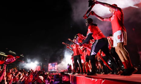 Fans and flares: Benfica celebrate after first title win in four years – video