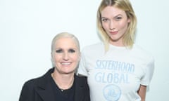 Maria Grazia Chiuri, with Karlie Kloss wearing a 'Sisterhood is global' T-shirt, at Paris Fashion Week