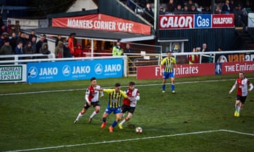 Accrington winger John O'Sullivan attacking the Woking defence down by the Moaners' Corner stand in the second half.