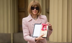 Anna Wintour poses for photos after being made a dame at Buckingham Palace.