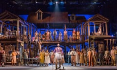 Eric Greene, centre, as Porgy, and the 40-strong chorus of Porgy and Bess at the Coliseum.