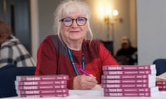 Jen Wilson in 2019 with copies of her book, Freedom Music