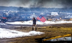 Dakota Access Pipeline protest, Standing Rock, North Dakota, USA - 22 Feb 2017<br>Mandatory Credit: Photo by ddp USA/REX/Shutterstock (8433534e) Defiant Dakota Access Pipeline water protectors faced-off with various law enforcement agencies the day the camp was slated to be raided. Dakota Access Pipeline protest, Standing Rock, North Dakota, USA - 22 Feb 2017 Many protestors and independent journalist, who were all threatened with multiple felony charges if they didn't leave, were met with militarized police on the road abutting the camp. At least six were arrested, including a journalist who reportedly had sustained a broken hip. (Photos By Michael Nigro) didn't leave, were met with militarized police on the road abutting the camp. At least six were arrested, including a journalist who reportedly had sustained a broken hip