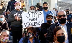 girl holding a sign which reads 'stop gun violence'