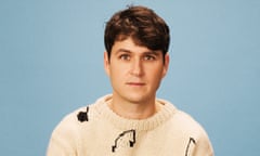 Ezra Koenig from Vampire Weekend photographed in London in February 2024.
Stylist: Helen Seamons; Stylist assistant: Sam Deaman; Grooming: Neusa Neves using Obayaty by Mario and colour wow hair; Vintage music note knit jumper (contemporarywardrobe.com) and cream cargo trousers (carhartt-wip.com). this page: