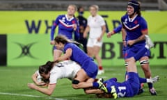 England's Emily Scarratt goes over to score.