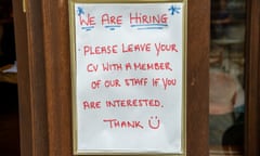 A sign outside a restaurant in Bracknell that reads: 'We are hiring. Please leave your cv with a member of our staff if you are interested. Thank you.'