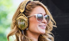 Paris Hilton wearing headphones