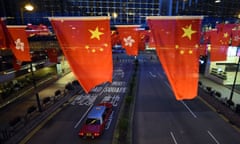 Hong Kong celebrates 20th return to China anniversary - 25 Jun 2017<br>Mandatory Credit: Photo by Imaginechina/REX/Shutterstock (8880087l) Vehicles drive under flags of China and Hong Kong Special Administrative Region of the People’s Republic of China decorated to mark the 20th anniversary of Hong Kong’s return to the motherland in Hong Kong Hong Kong celebrates 20th return to China anniversary - 25 Jun 2017