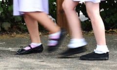 Feet of school children walking