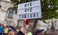 A crowd cheers Keir Starmer’s arrival at Downing Street as the new prime minister