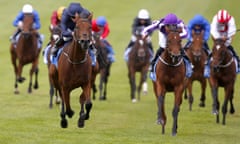 Rhododendron and Ryan Moore, left, beat the winner’s stablemate Hydrangea to claim victory in the Fillies’ Mile at Newmarket.