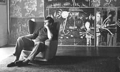 David Storey at home in Belsize Park, London, 1961, with his paintings in the background.