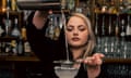 Close-up image of a cocktail being poured into a glass by a bartender at Neon Cactus in Leeds.