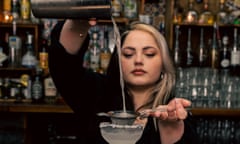 Close-up image of a cocktail being poured into a glass by a bartender at Neon Cactus in Leeds.