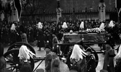 FILE - The gun carriage bearing the coffin of King George V, after leaving Westminster Hall in London on January 28, 1936. Hundreds of thousands of people are expected to flock to London’s medieval Westminster Hall from Wednesday, Sept. 14, 2022, to pay their respects to Queen Elizabeth II, whose coffin will lie in state for four days until her funeral on Monday. (AP Photo/Len Puttnam, File)